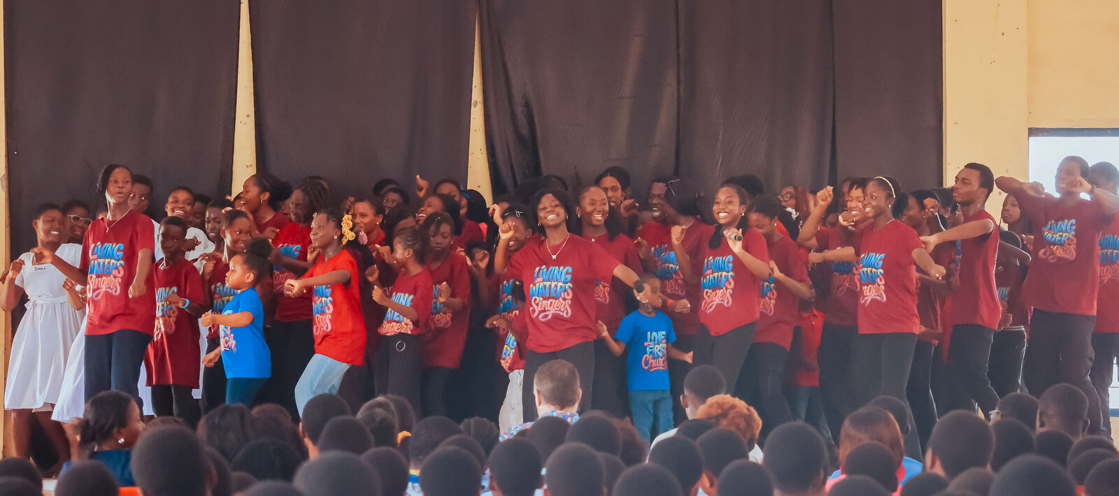 Living Waters Singers, full team in red shirts